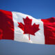 Ontario Teachers fund ditches emissions intensity target for climate investment goal The Canadian flag blows in the wind.