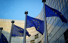 EU flags in front of European Commission building in Brussels