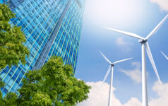 Modern high-rise buildings are powered by wind turbines. and the fresh air from the trees