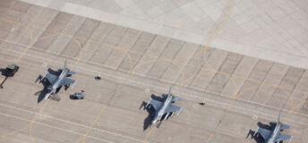 Aerial view of fighter jets on a runway