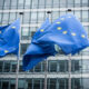 EU flags in front of the European Commission