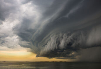 How are asset owners pushing their managers on climate engagement? Super cell storm cloud above the ocean