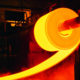 Red-hot roll of steel in steel mill
