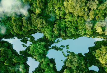 A lake in the shape of the world's continents in the middle of untouched nature. A metaphor for ecological travel, conservation, climate change, global warming and the fragility of nature.3d rendering