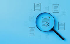 magnifying glass on note