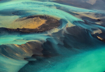 RI Climate Risk & Resilience Survey 2026 Icelandic landscape with clouds and hills